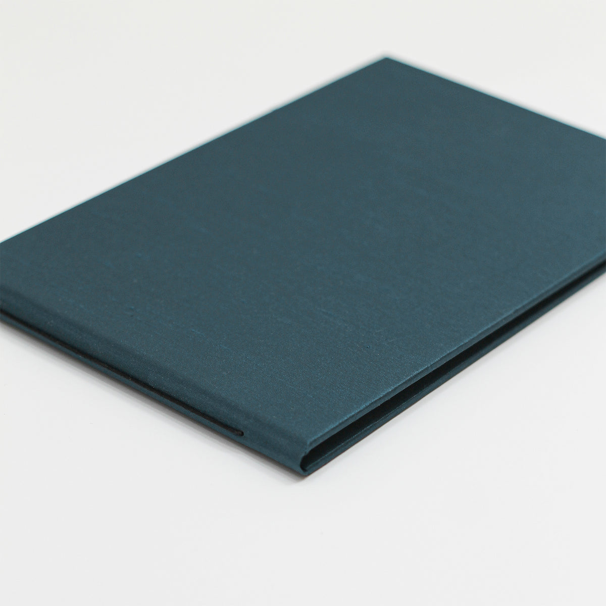 Guestbook Embossed with “Guests” | Cover: Teal Blue Silk | Available Personalized