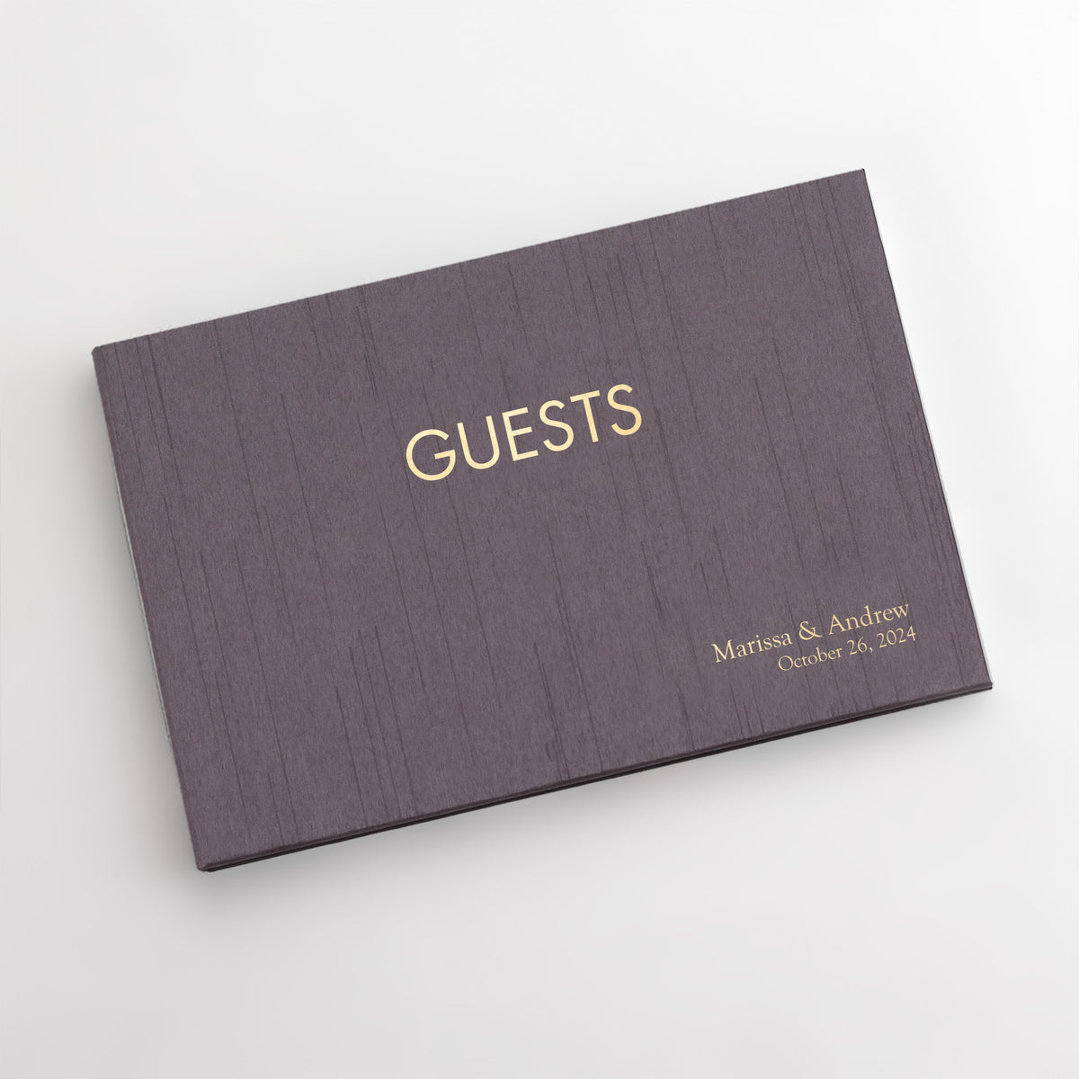 Guestbook Embossed with “Guests” with Amethyst Silk Cover