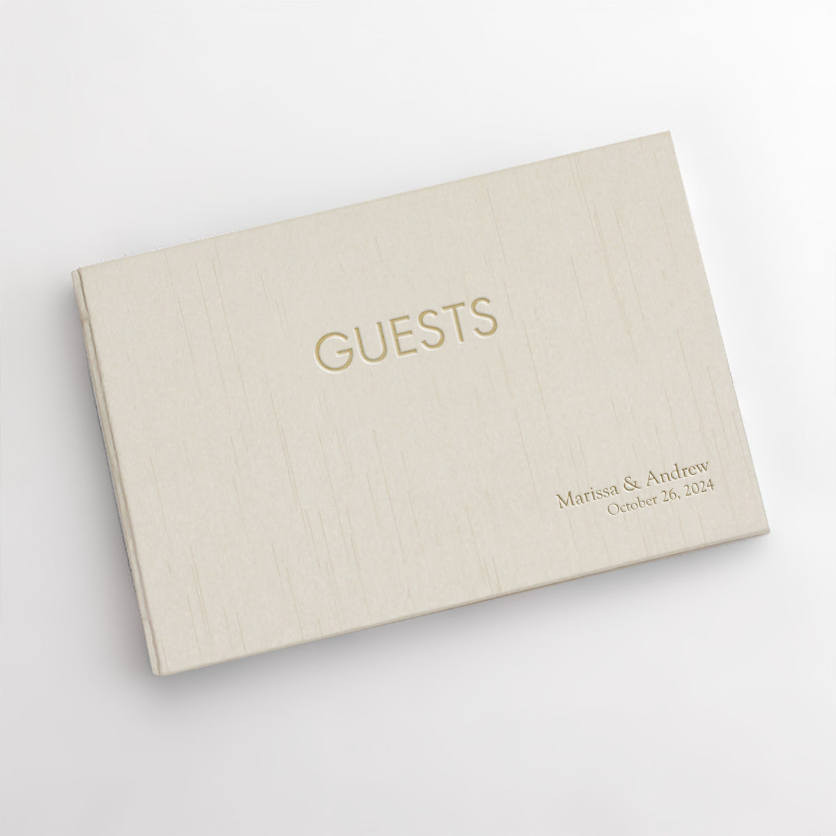Guestbook Embossed with “Guests” with Champagne Silk Cover