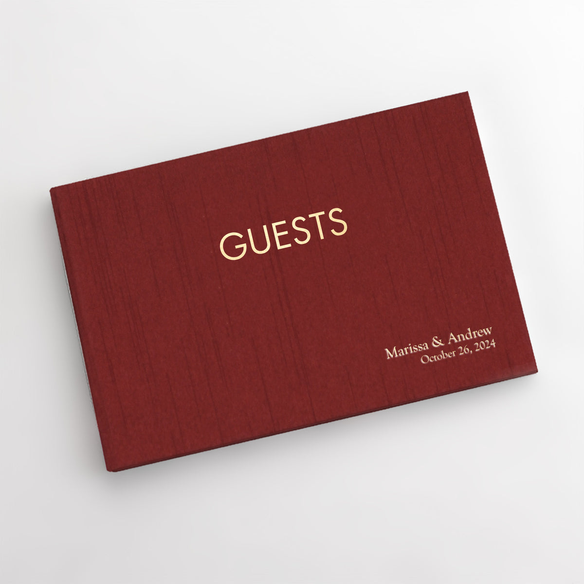Guestbook Embossed with “Guests” with Garnet Silk Cover
