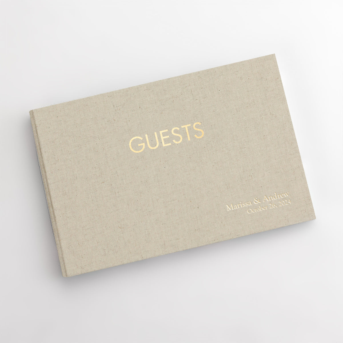 Guestbook Embossed with “Guests” with Natural Linen Cover