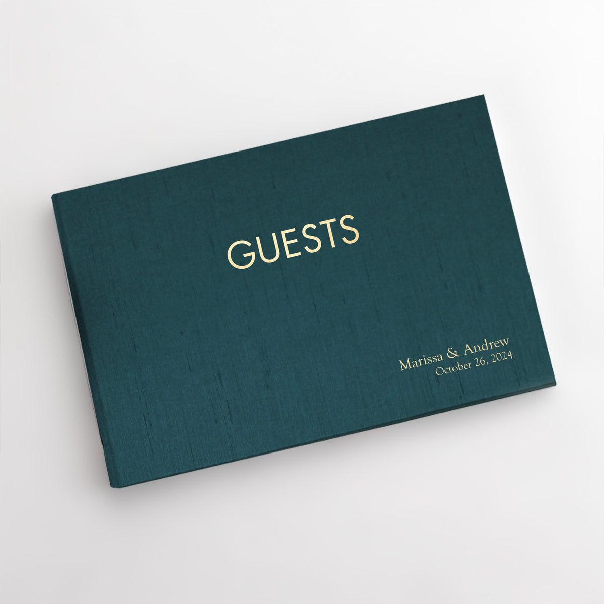 Guestbook Embossed with “Guests” with Teal Blue Silk Cover