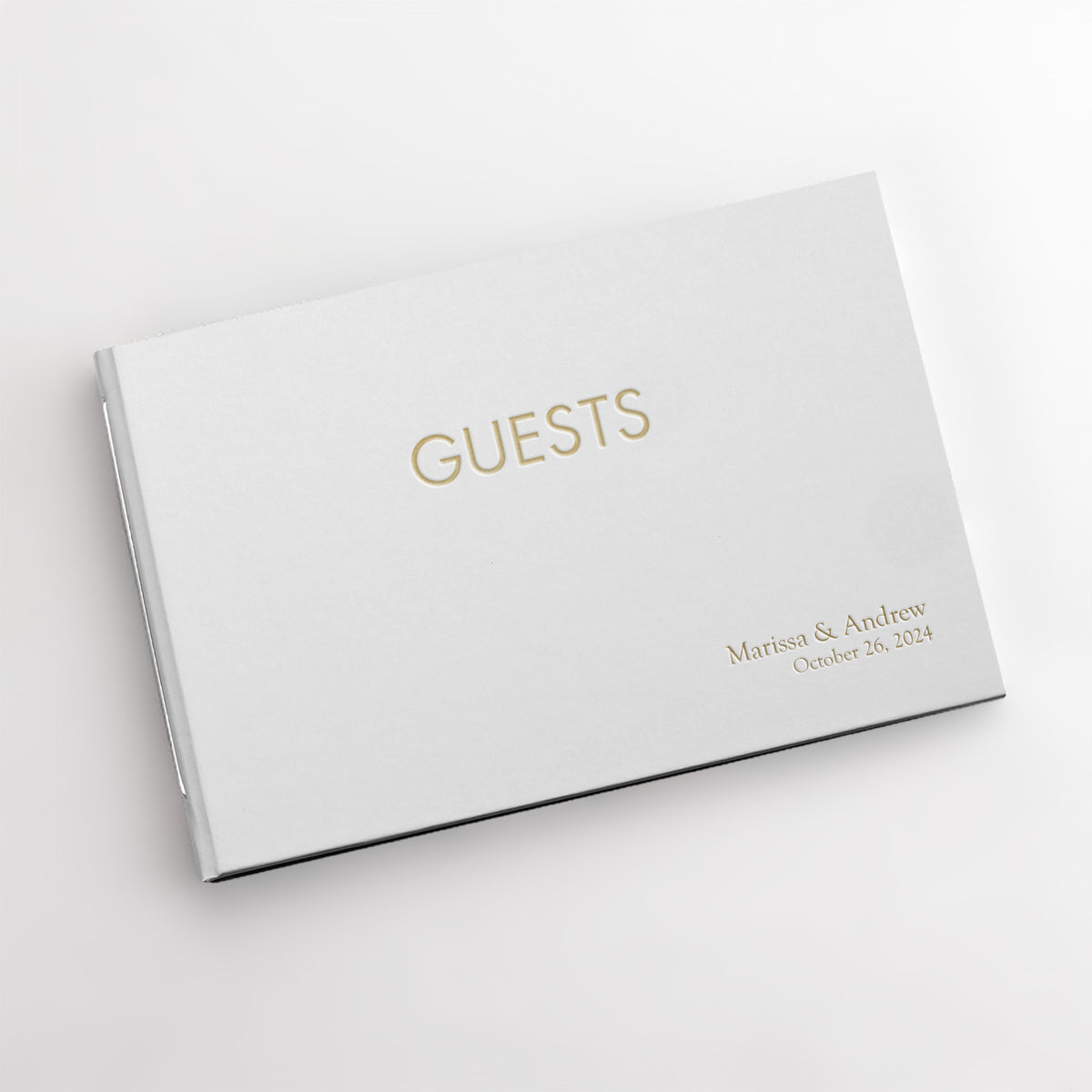 Guestbook Embossed with “Guests” with White Vegan Leather Cover